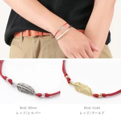 CHALISA T.. Anklets^/ Mini Feather Notched Cord Bracelet